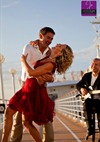 Couple Stood On A Pier