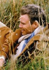 Male Lying in a field
