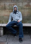 Male Sat On A Bench